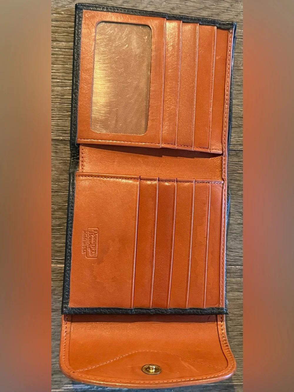 Dooney & Bourke Black Leather Wallet with Brown Trim